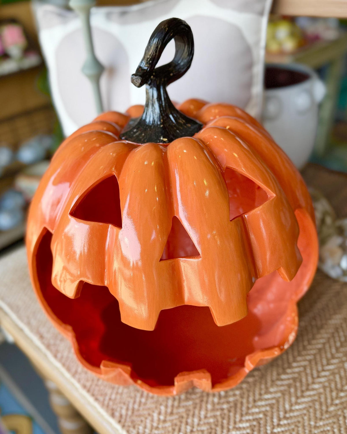 oversized jack-o’-lantern decoration. With its wide-open grin and wonderfully expressive face, it brings plenty of playful personality to an entryway, mantel, or porch.