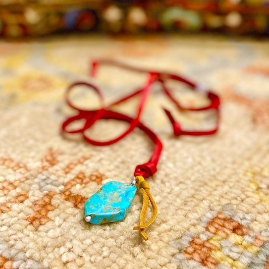 Necklace - Turquoise Slice with Sterling and Leather Tassel on Red Leather